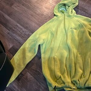 Neon light green Columbia coat.
